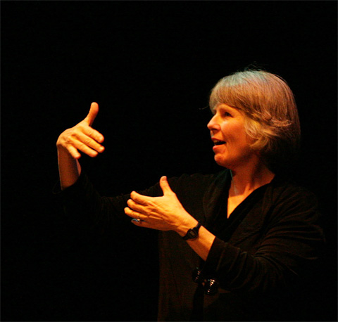 Woman interpreting with sign language